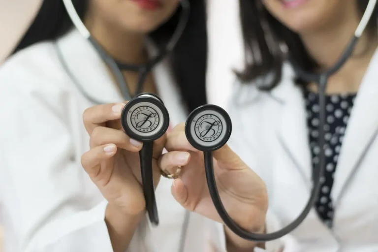 Indian female healthcare professionals with stethoscopes, representing remote healthcare staffing solutions from India